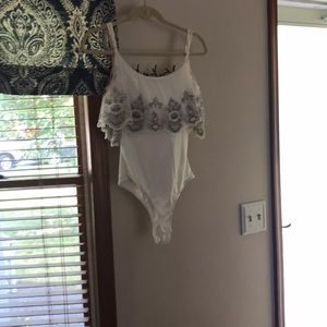 Off the shoulder body suit